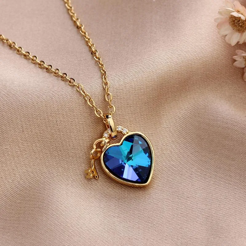 Collares colgantes de moda con forma de corazón azul brillante del océano para mujeres y niñas, color dorado, circonita cúbica, árbol de diamantes de imitación_voghion.com