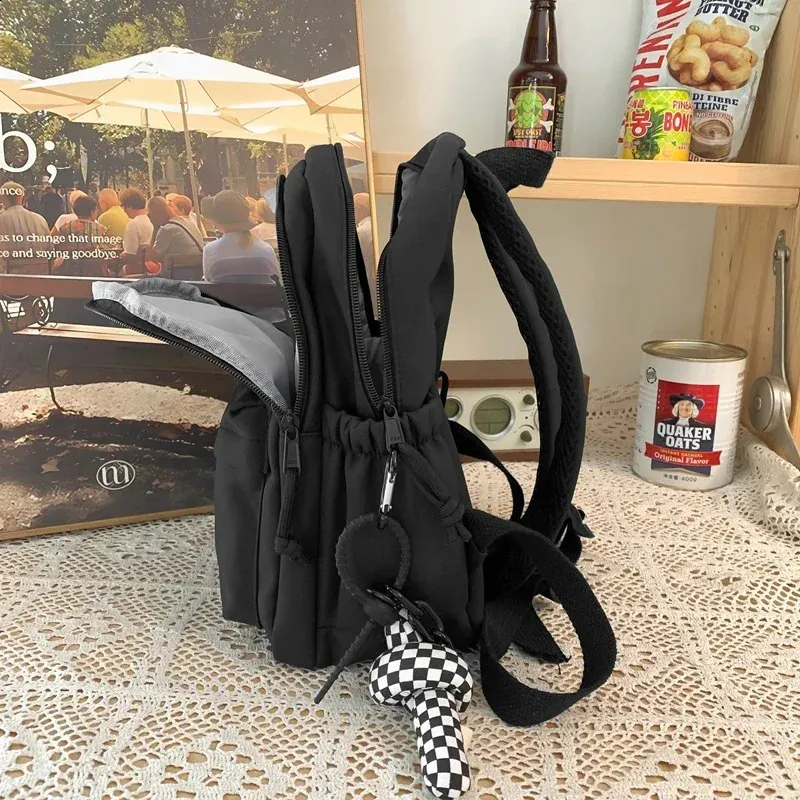 Large capacity casual waterproof nylon backpack fashionable elementary and middle school student bag 240820_voghion.com