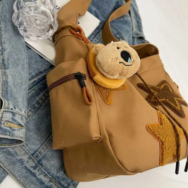 Borsa a tracolla a forma di stella in tela da donna, zaino per studenti Y241116_voghion.com