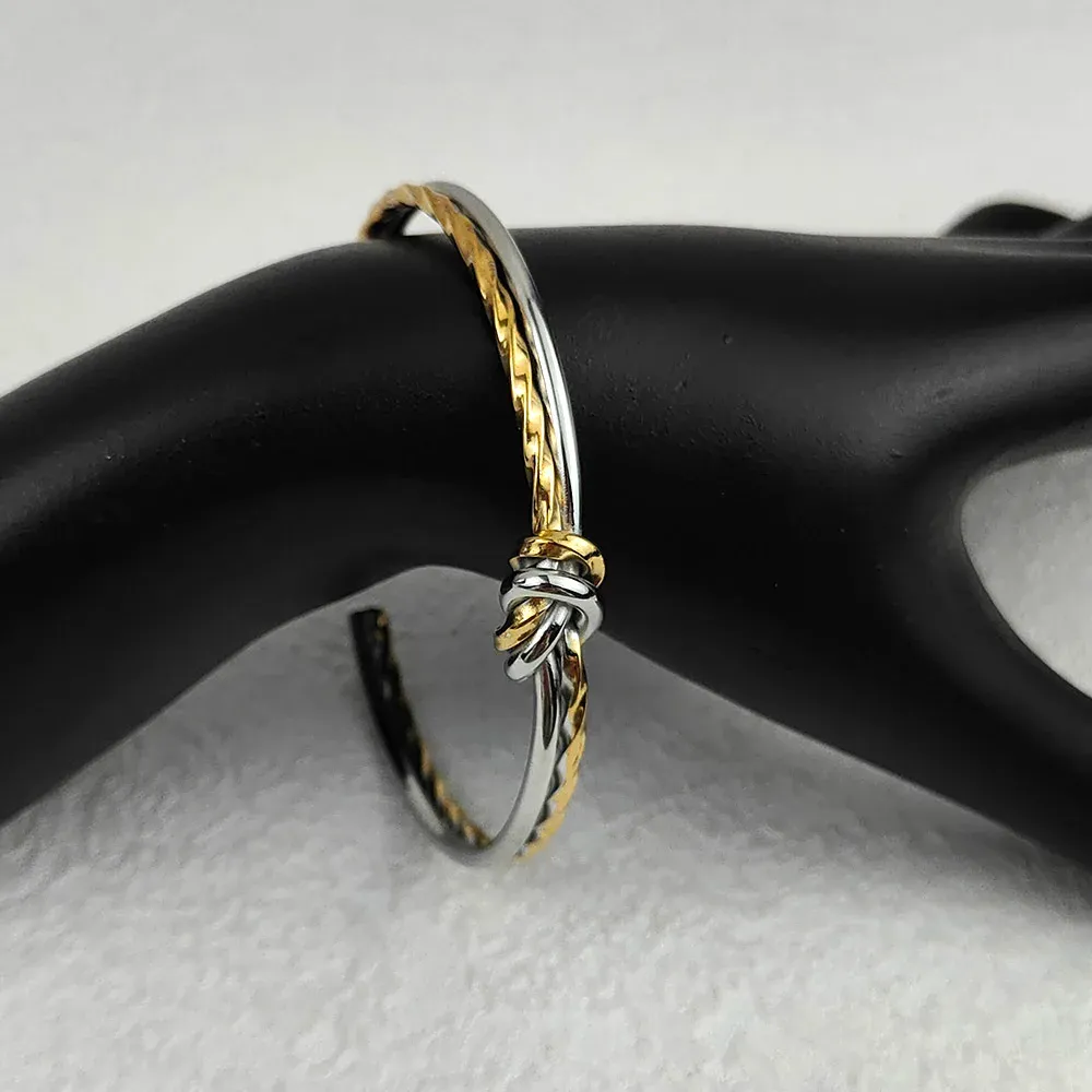 Knotted cuff armband i rostfritt stål guldpläterad dam_voghion.com